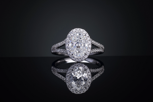 7 Total Carats Ring Split Shank, Oval Cut, D Color, VS2 Clarity  in 14K White Gold  Model: J724